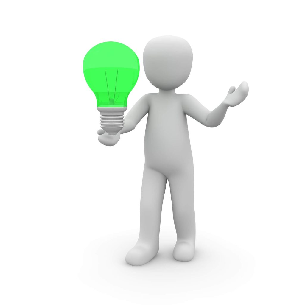 Student holding a light bulb